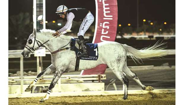 Anas al-Seyabi rides Al Ghazali Studu2019s AJS Wathanan to Rodat Al Maida Cup victory at QRECu2019s Al Rayyan Park yesterday. PICTURE: Juhaim