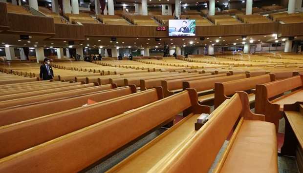 An empty grand hall of a church is pictured during a service in Seoul, South Korea