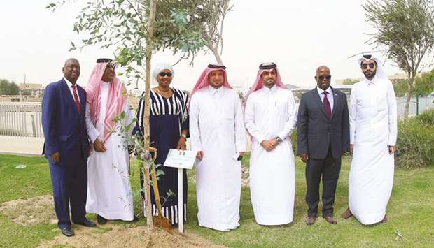 Ministry of Foreign Affairs representatives taking part in the tree-planting ceremony.