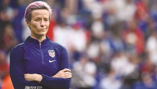In this July 2, 2019, picture, United Statesu2019 forward Megan Rapinoe looks on during warm up prior to the  2019 Womenu2019s World Cup semi-final against England in Lyon, France. US womenu2019s national team have filed a gender discrimination suit against the federation. (AFP)