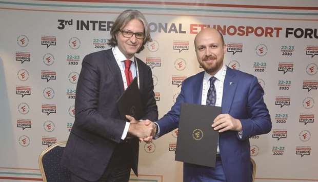 Executive director of Save the Dream Massimiliano Montanari (left) and president of WEC Bilal Erdogan during the signing ceremony.