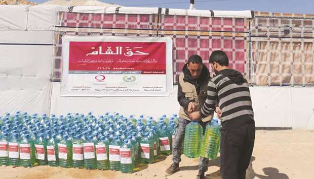 Qatar Charity distributes aid to displaced Syrians in Lebanon