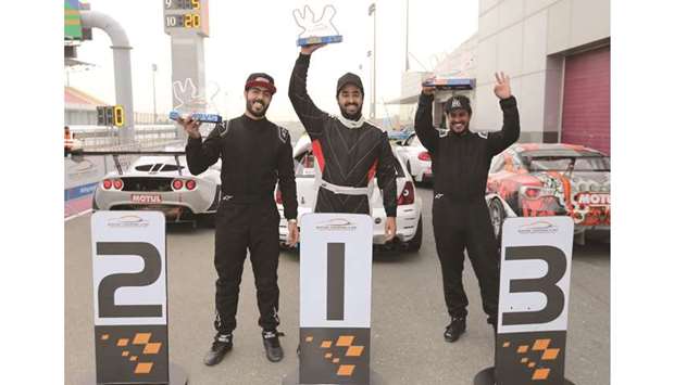 Ghanim al-Maadheed (centre) won the Qatar Touring Car Championship 2K Class, with Ibrahim al-Abdulghani (left) second and Nasser al-Ahbabi third.