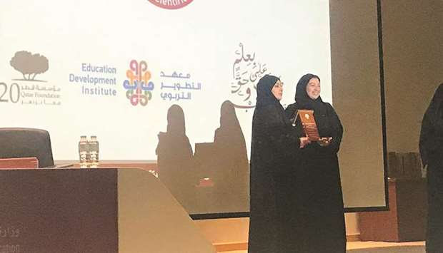 Al-Bairaq programmeu2019s official receiving the award.