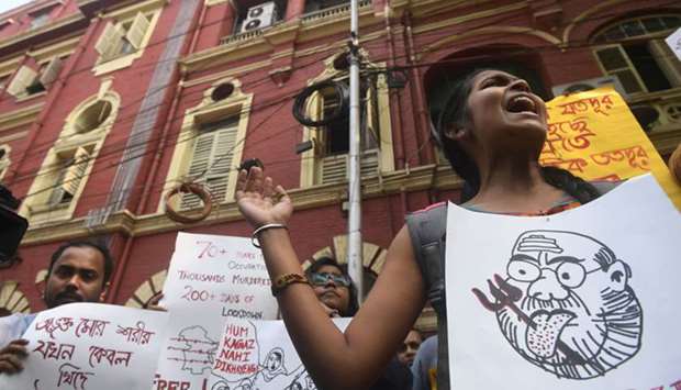 Students and social activists shout slogans during a protest against Indiau2019s new citizenship law and against the visit of federal Home Minister Amit Shah for a political rally in Kolkata yesterday.