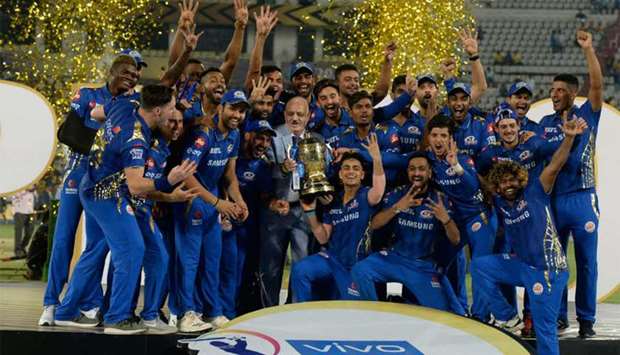 A jubilant Mumbai Indians pose with the IPL trophy after defeating Chennai Super Kings in the final on Sunday, May 12, 2019, in Hyderabad. (AFP)