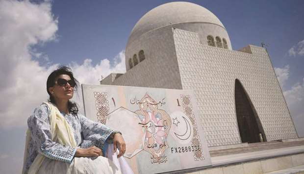 DOHA TO KARACHI: Mala with her artwork (a one rupee currency note) that she carried to the mausoleum of Pakistanu2019s founder Quaid-i-Azam Muhammad Ali Jinnah in Karachi.