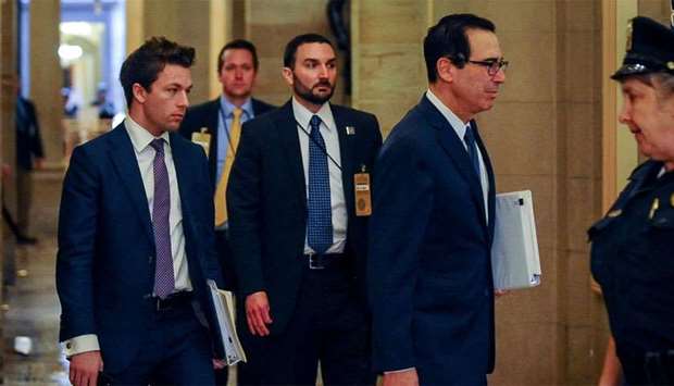 Treasury Secretary Steve Mnuchin arrives for a meeting in the office of US Senate Majority Leader Mitch McConnell (R-KY) to wrap up work on coronavirus economic aid legislation