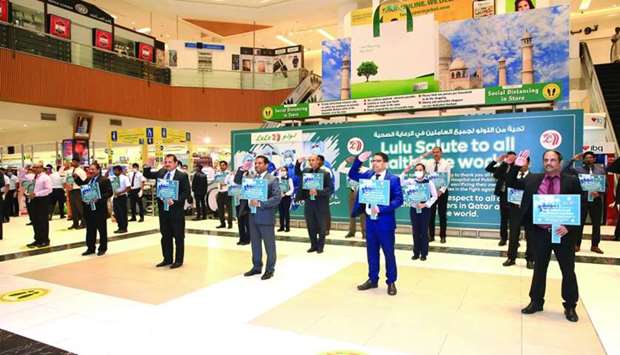 LuLu Hypermarkets officials and staff at a ceremony to honour healthcare workers across the world.