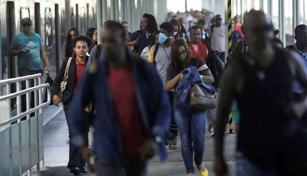 Passengers at the Central do Brasil train station during the coronavirus disease outbreak in