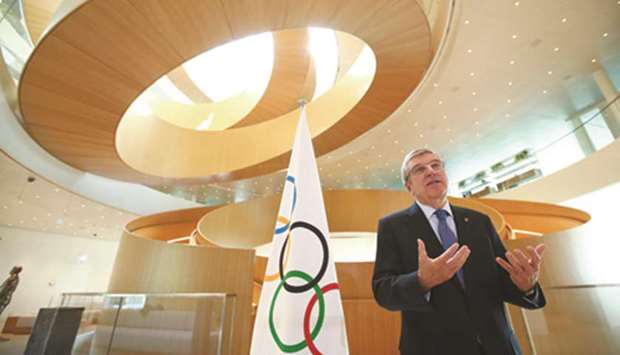 International Olympic Committee President Thomas Bach speaks after the historic decision to postpone the 2020 Tokyo Olympic Games due to the coronavirus pandemic, in Lausanne, Switzerland, yesterday. (AFP)