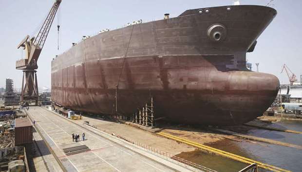 The super large crude carrier Dailan Venture sits docked at the Dalian shipyard in Liaonin province.