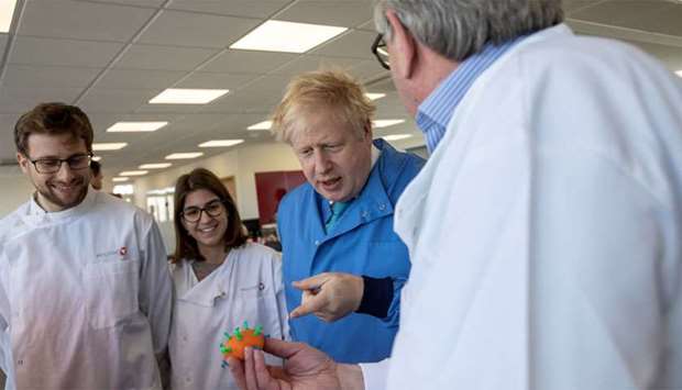 FILE PHOTO: Britain's Prime Minister Boris Johnson visits the Mologic Laboratory