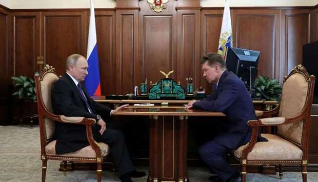 Russian President Vladimir Putin meets with Chief Executive of Gazprom company Alexei Miller in Moscow, Russia