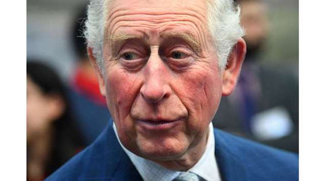 Britain's Prince Charles, Prince of Wales reacts during his visit to the London Transport Museum in London on March 4, to take part in celebrations to mark 20 years of the museum. Prince Charles, the eldest son and heir to Queen Elizabeth II, has tested positive for the new coronavirus, his office said on March 25.