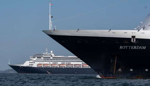 Holland America's cruise ship Zaandam (L) and the Rotterdam cruise ship are seen in Panama City bay