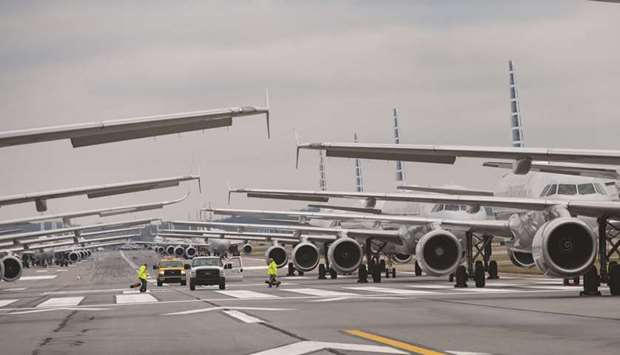 Jets are parked on runway 28 at the Pittsburgh International Airport on Friday in Pittsburgh, Pennsylvania.