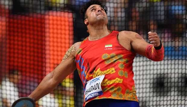 Iranu2019s Ehsan Hadadi in action during the World Athletic Championships in Doha. (Reuters)