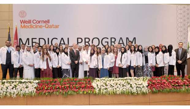 Final-year medical students of Weill Cornell Medicine u2013 Qatar (WCM-Q) with officials.