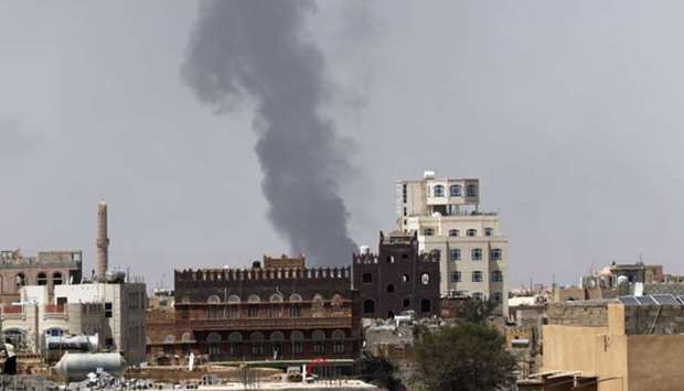 Smoke billows from the site of a Saudi-led air strike in Sanaa, Yemen.