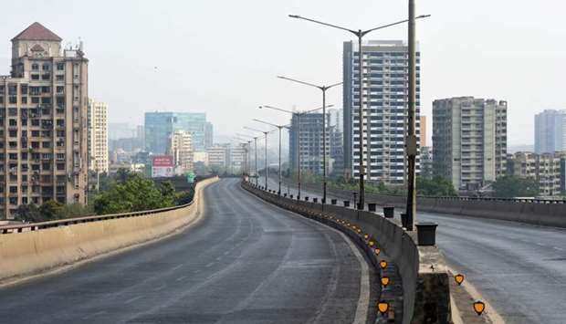 A deserted street in pictured during a government-imposed nationwide lockdown as a preventive measure against the spread of the Covid-19 coronavirus in Mumbai, India
