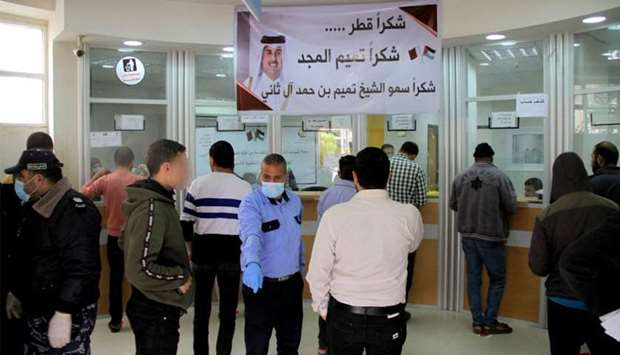 Qatar begins disbursing cash aid to needy Gaza families