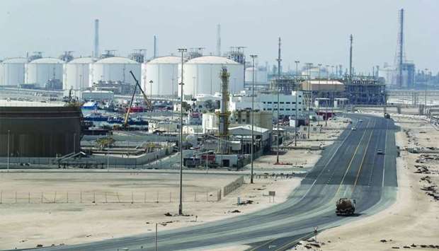 This file photo taken on February 6, 2017 shows the Ras Laffan Industrial City, Qatar's principal site for production of liquefied natural gas and gas-to-liquids, some 80km north of Doha. Qataru2019s ratings benefit from very large hydrocarbon reserves and associated export capacity, which in turn provides the government with substantial financial means, according to CI.