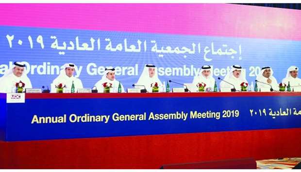 Al-Khater and al-Othman with other UDC directors at the company's ordinary general assembly here. PICTURE: Shemeer Rasheed
