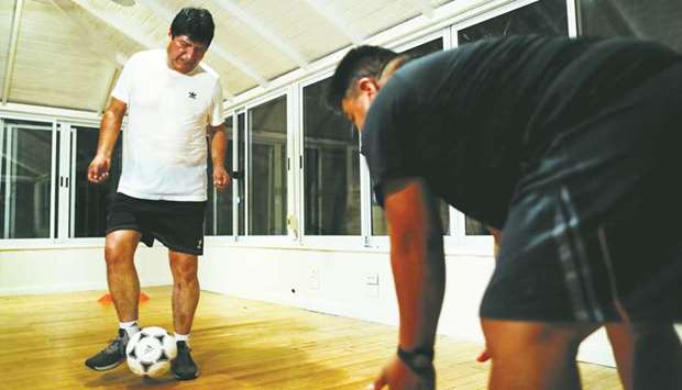Former Bolivian president Evo Morales exercises at his home, in Buenos Aires, Argentina, yesterday.