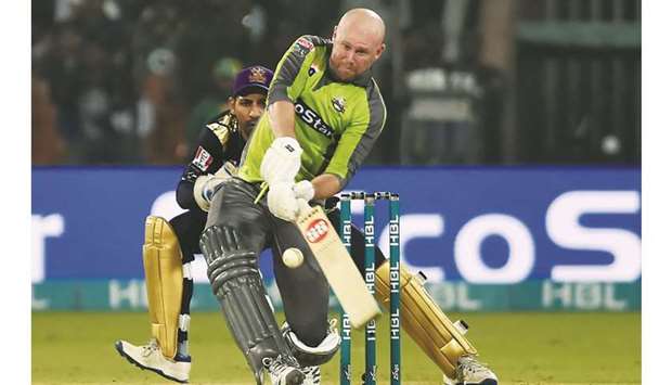 Lahore Qalandarsu2019 Ben Dunk plays a shot during their PSL match against Quetta Gladiators at the Gaddafi Cricket Stadium in Lahore yesterday. (AFP)