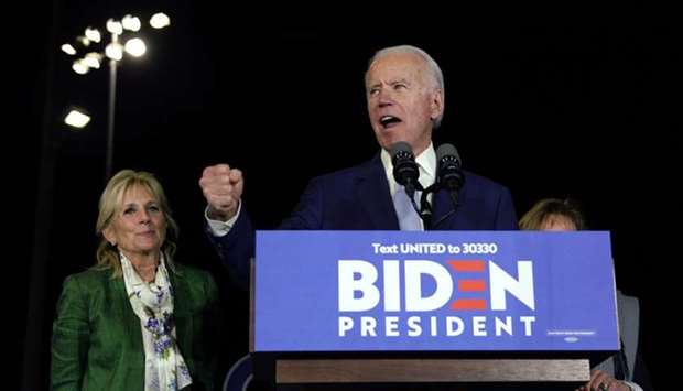 Democratic U.S. presidential candidate and former Vice President Joe Biden addresses supporters with his wife Jill at his side during his Super Tuesday night rally in Los Angeles, California