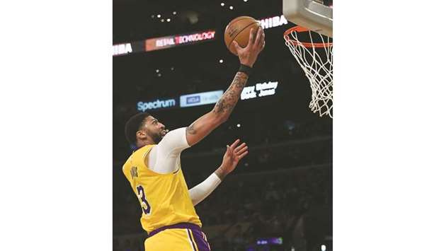 Los Angeles Lakers forward Anthony Davis (3) goes to the basket in the second half against the Philadelphia 76ers on Tuesday. PICTURE: Richard Mackson u2013USA TODAY Sports
