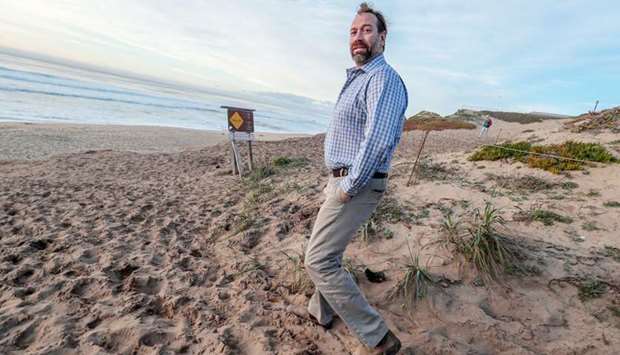 ROOM WITH A VIEW: David Revell, a coastal geomorphologist, who has consulted for a number of cities, including Marina, admires the coastline at Marina State Beach.