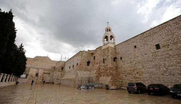 The Church of the Nativity that was closed as a preventive measure against the coronavirus, is seen from outside in Bethlehem in the Israeli-occupied West Bank