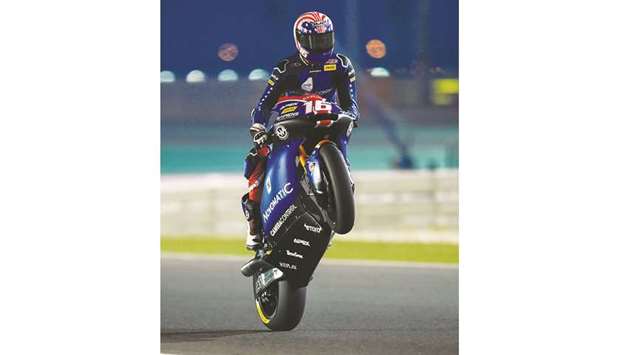American Racingu2019s Joe Roberts does a wheelie during a Moto2 free practice session at Losail International Circuit during the QNB Grand Prix of Qatar weekend yesterday. PICTURE: Noushad Thekkayil