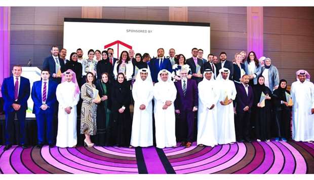The award winners with QGBC officials. PICTURE: Noushad Thekkayil