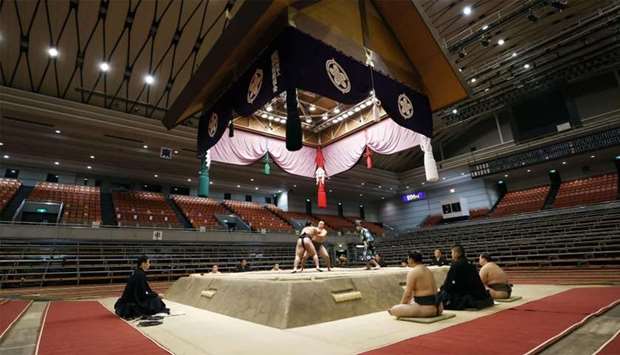 Spectator's seats are seen empty during a match of the Spring Grand Sumo Tournament which is taking behind closed doors amid the spread of the new coronavirus, in Osaka, western Japan