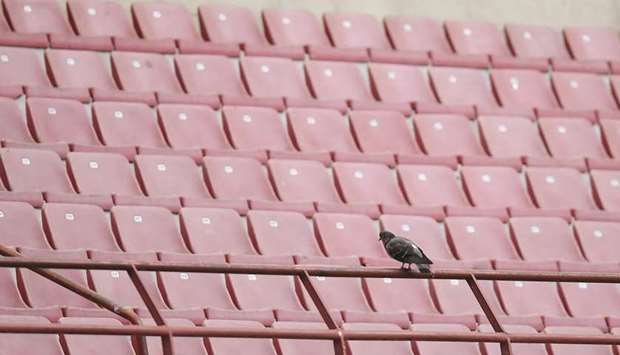 An empty San Siro stadium where Genoa beat AC Milan yesterday.