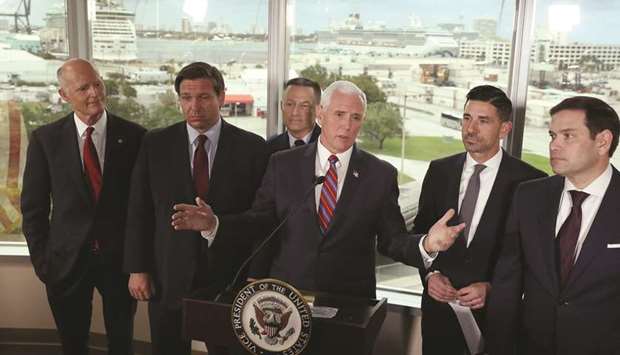 (From left) Florida Governor Ron DeSantis, US Coast Guard Admiral Eric Jones, Vice President Mike Pence, Chad F Wolf, acting Secretary of Homeland Security, attend a press conference in Fort Lauderdale, Florida.