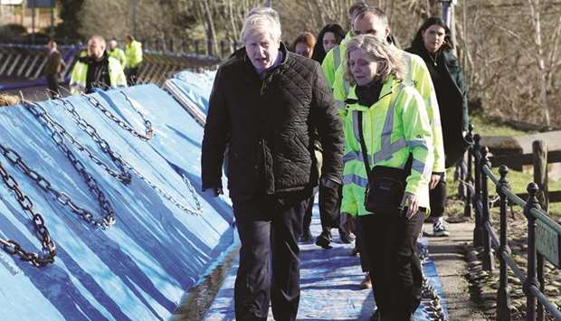 Prime Minister Boris Johnson visits Bewdley to see recovery efforts following recent flooding in Britain yesterday.
