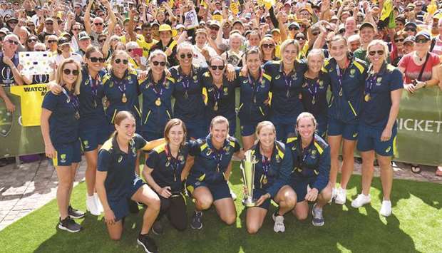 The Australian womenu2019s T20 team celebrate their World Cup win with fans in Melbourneu2019s Federation Square yesterday. (AFP)