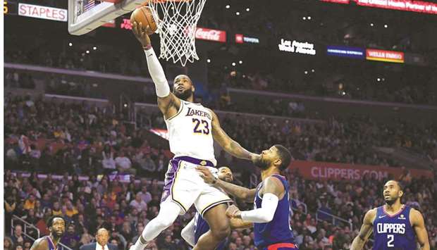 LeBron James of the Los Angeles Lakers scores against LA Clippers during their NBA game at the Staples Center in Los Angeles. (Getty Images/AFP)