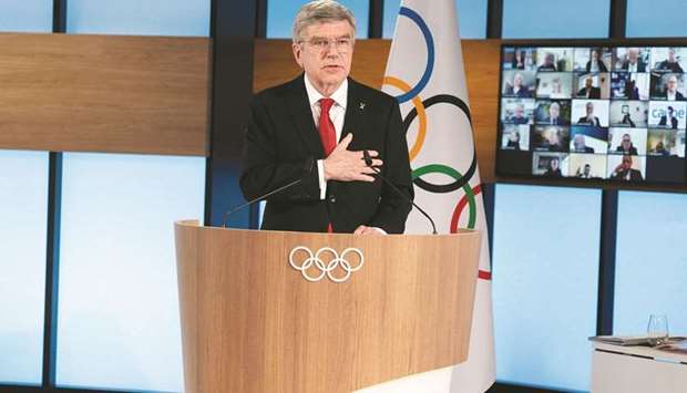 International Olympic Committee President Thomas Bach reacts after his re-election during the 137th IOC Session and virtual meeting in Lausanne yesterday.