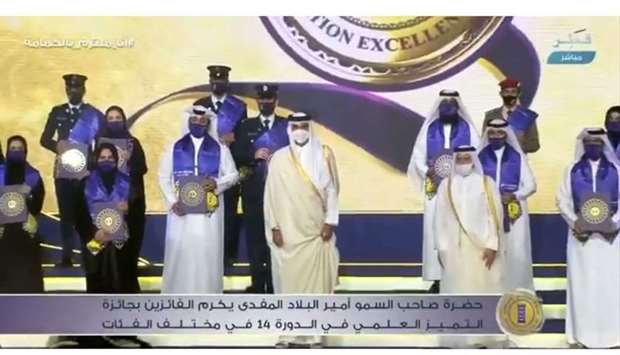 His Highness the Amir Sheikh Tamim bin Hamad al-Thani with the winners of the Education Excellence Day Award