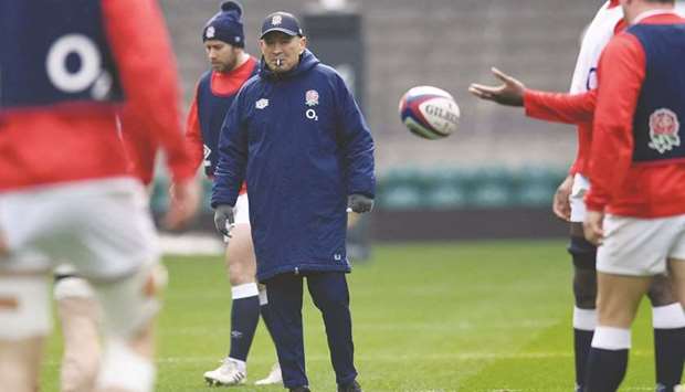 Englandu2019s coach Eddie Jones takes part in a team training session at Twickenham Stadium in London on the eve of their Six Nations match against France. (AFP)