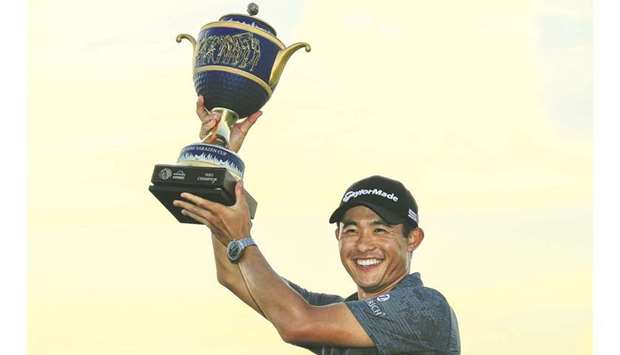 Collin Morikawa of the United States celebrates with the Gene Sarazen Cup during the trophy ceremony after winning the final round of World Golf Championships-Workday Championship at The Concession in Bradenton, Florida.  (Getty Images/AFP)