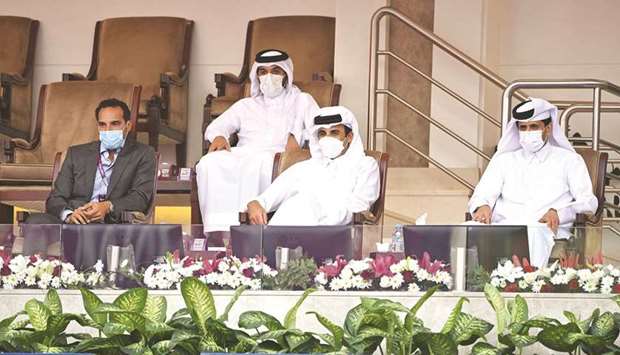 His Highness the Amir Sheikh Tamim bin Hamad al-Thani watches the match between Spain's Garbine Muguruza and Russia's Veronika Kuderme on Monday on the opening day of the WTA Qatar Total Open 2021 at the Khalifa International Tennis and Squash Complex.