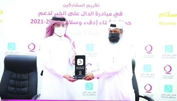 At a ceremony, Abdulaziz Jassim Hajji, director of the Customer Service Department at QC, honoured the top 10 supporters of the initiative, awarding them charity shields.