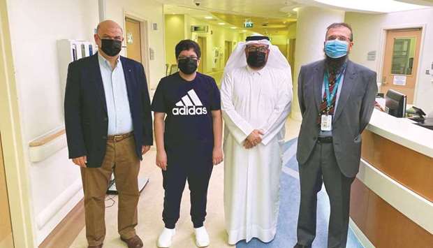 (From left): Dr Ahmed Mounir, patient M A, M A's father and Dr Talal Ibrahim.