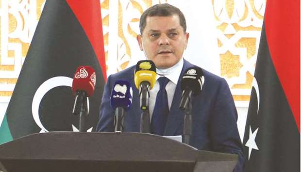 Libyau2019s new interim prime minister Abdul Hamid Dbeibah speaks after being sworn in the eastern Libyan city of Tobruk yesterday to lead the war-torn countryu2019s transition to elections in December, after years of chaos and division.
